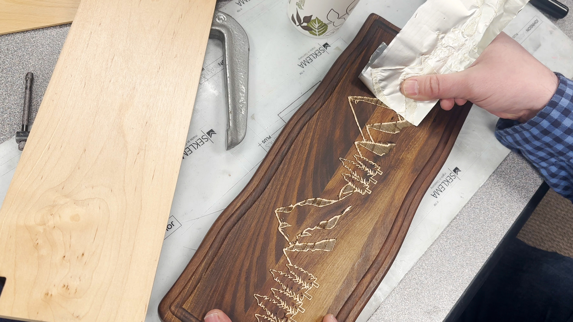 Carefully remove tape from veneer inlay