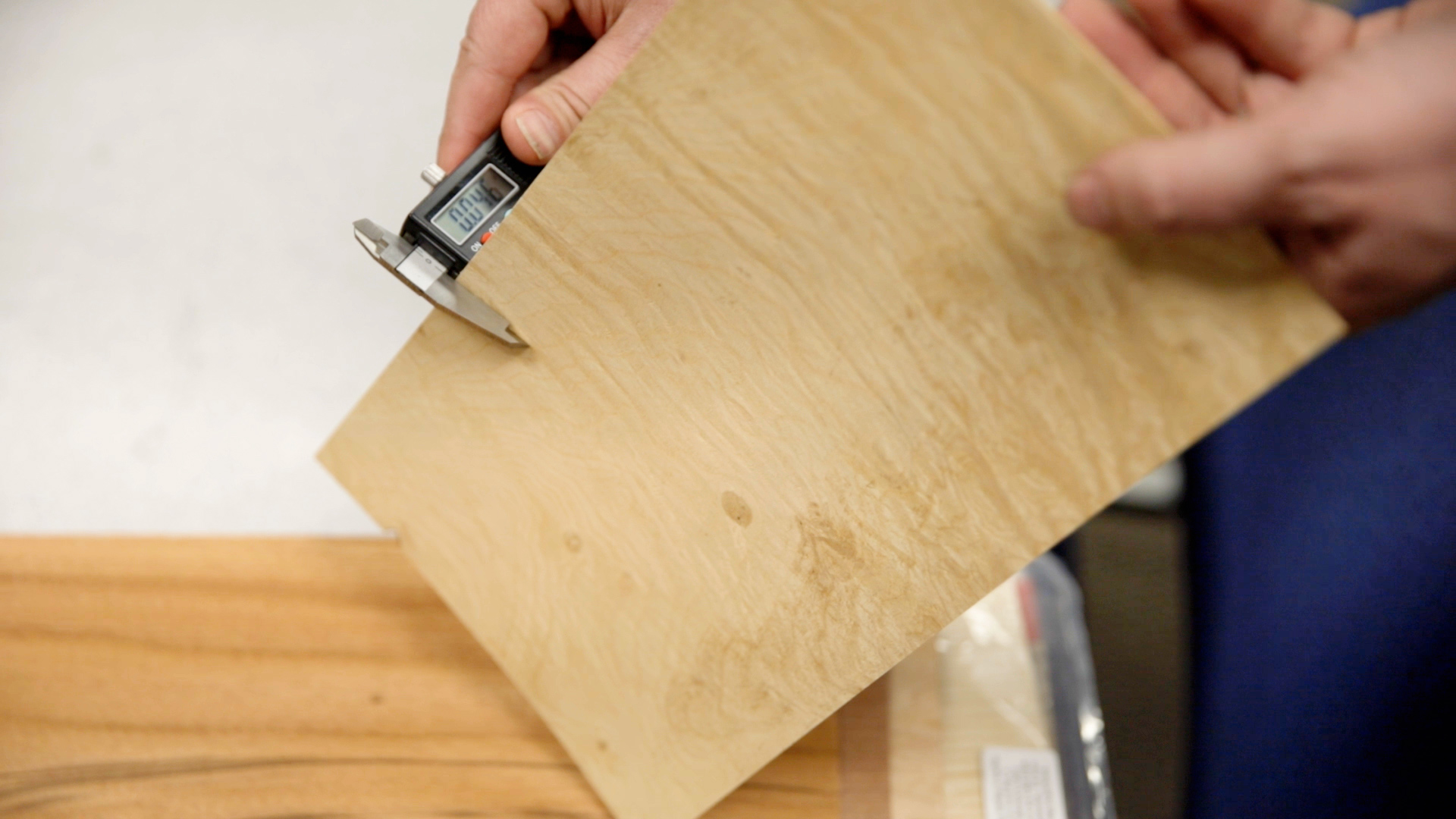 Measure the thickness of veneer using calipers