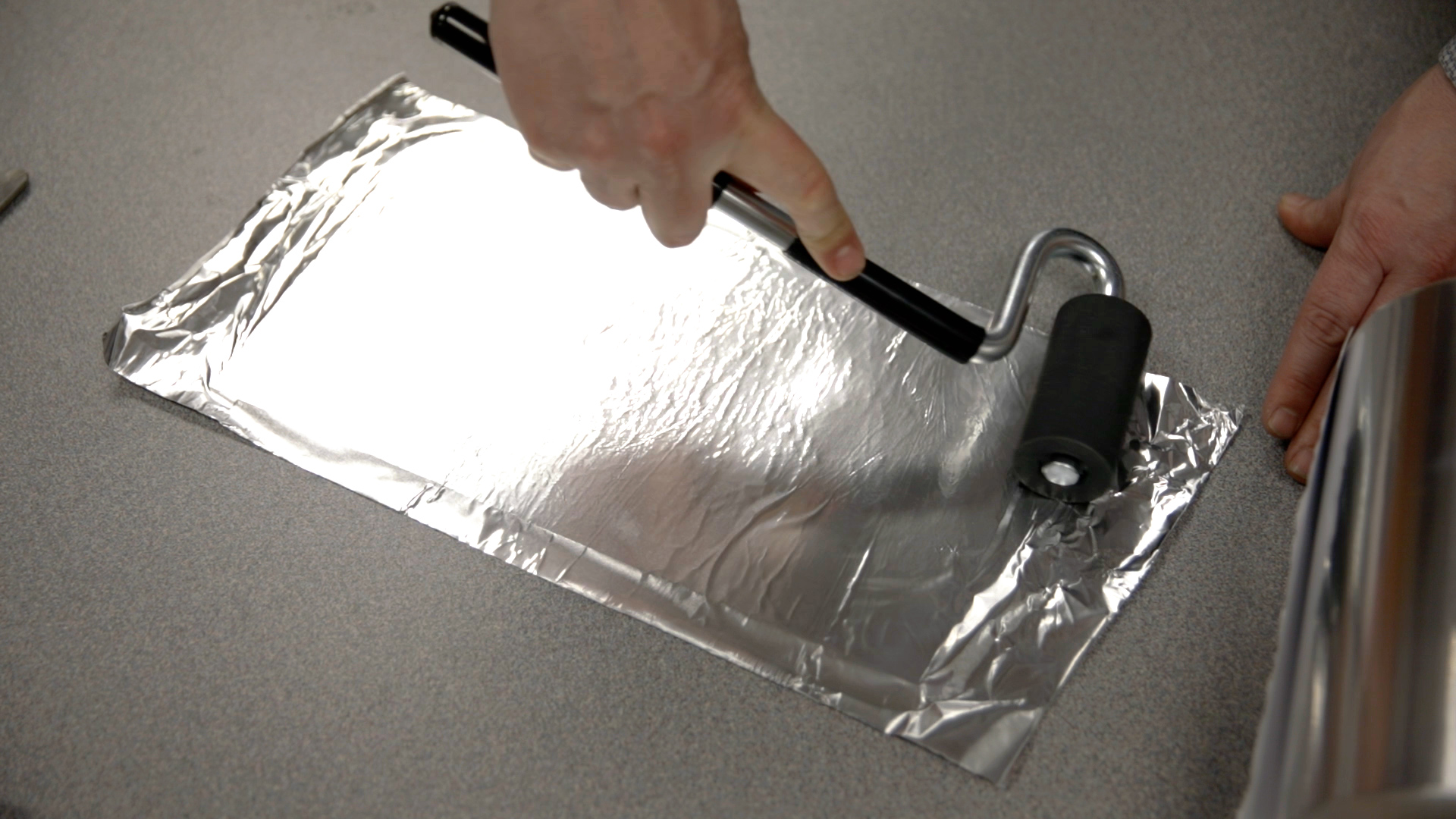 Apply aluminum foil tape to veneer